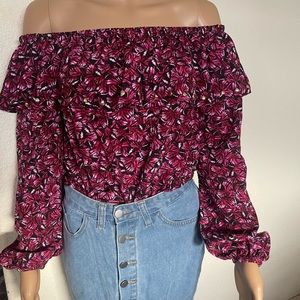 Elegant beautiful off the shoulders blouse.